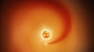 An illustration of Betelgeuse and a companion star leaving a wake in its atmosphere