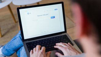 A person uses a chatbot to help them with a query.